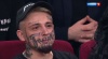 Николай Маркелов - тату-модель, на его лице куча непонятных татуировок